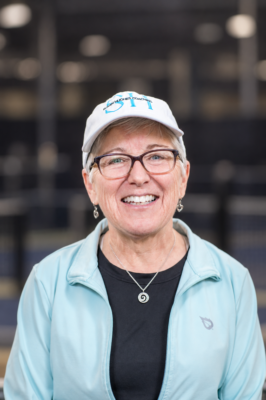Coach Sue Hughes smiling